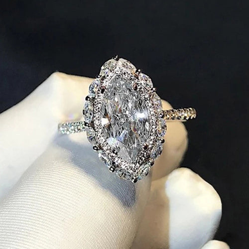 Close-up of marquise center and crystal halo on glove