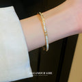 Gold Tone Hinged Bangle With Triple Rows Of Clear Crystals view 4