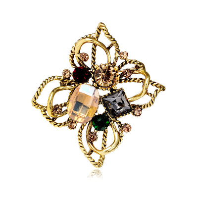 Front product view of the flower brooch pin in gold and black
