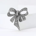 Openwork Ribbon Bow Brooch An Openwork Ribbon Bow Crystal Accent Pin view 3