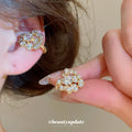 Crystal Flower Clip-On Earrings in Silver and Gold view 3