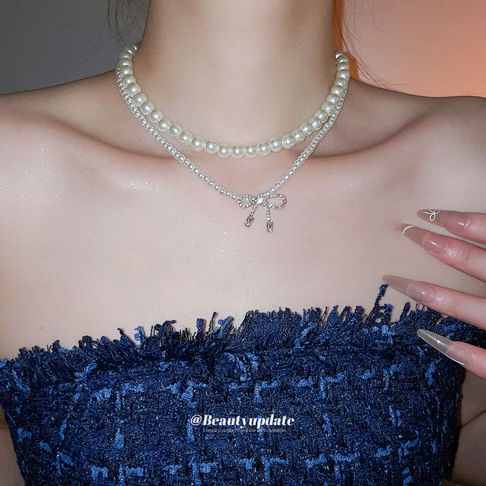 White Pearl Bow Necklace Set with Two Layered Strands