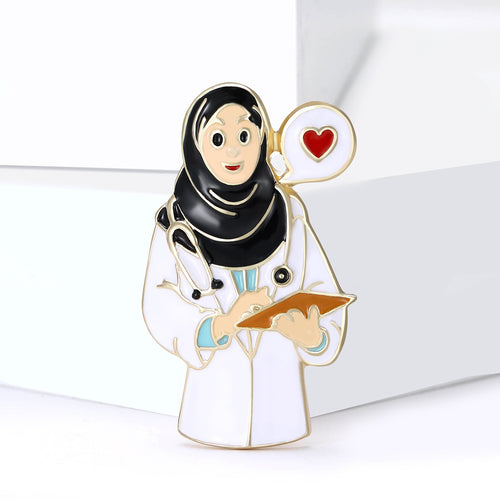 Female doctor figure pin on white blocks with clipboard detail