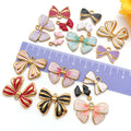 Gold-Tone Bow and Butterfly Metal Charms with 16 Listed Options view 2
