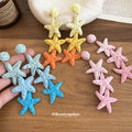 Woven Starfish Drop Earrings With Polished Metal Tone Details view 4