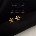 Gold Mini Snowflake and Whale Tail Stud Earrings Two Designs view 6