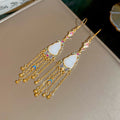 Gold Tone White Floral Green Bead Tassel Hook Earrings view 6
