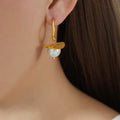 Gold Hoop Earrings White Pearl Curved Metal Disc Drop view 1