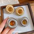 Ridged Round Stud Earrings With Brown Centers in Two Tones view 4