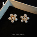 Gold Tone Pearl Flower Stud Earrings Clear Crystal Accents view 2