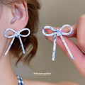Slim Bow Stud Earrings In Brown Blue And White Patterns view 4