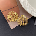 Gold and Silver Open Spiral Round Statement Stud Earrings view 4