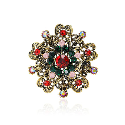 Antique gold floral wreath brooch red center on white