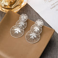 Gold and Silver Triple Open Radiating Disc Earrings view 3