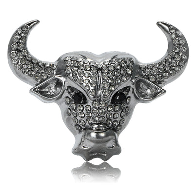 The first image shows the black bull head brooch from the front.