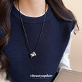 Horse And Pearl Pendant Necklace In Beige And Black view 3