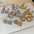 Crinkled Geometric Stud Earrings in Gold and Silver view 3