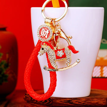 Gold Tone Crystal Rocking Horse Keychains with Braided Straps