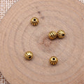 Grooved Pumpkin Round Beads in Silver and Gold Tones view 4