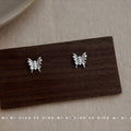 Silver Mini Butterfly Stud Earrings Triple Pearl Body view 4