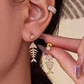 Crystal Ear Cuffs and Fish Skeleton Stud Earrings in Two Finishes view 2