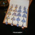 Crystal Leaf Cascade Drop Earrings In Gold And Silver Tones view 2