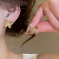Sculpted Openwork Butterfly Stud Earrings in Gold Tone view 2