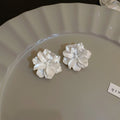 Glossy Sculpted Flower Stud Earrings in Three Colors view 8