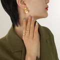 Fan Embossed Twist Stud Earrings Gold Steel Tone Pair view 4