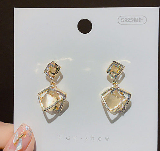 Geometric Cat Eye Earring Collection with Sculpted Polished Metal Details