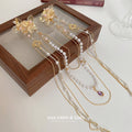 Gold Tone Floral Hair Clip With Pearl And Chain Drapes view 2