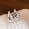 Polished Teardrop Stud Earrings in Gold and Silver Tone, Two Styles view 2