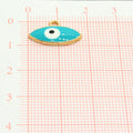 Gold Tone Marquise Enamel Evil Eye Huggie Earrings in Three Colors view 2