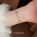 Gold Tone Butterfly Bracelet With Clear Crystal And White Shell Like Wings view 4