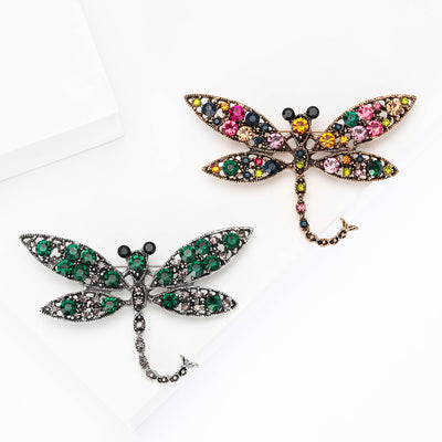 Crystal Dragonfly Brooch With Curled Tail shown from the front on a white background