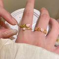 Three Mixed Pink Enamel Like Rings With Rose Tulip Or Linked Band view 2