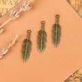 Vintage Alloy Feather Wing Keychain Charm Pendant