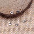 Tiny Flower Spacer Beads in Six Metal Color Finishes view 2