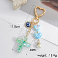 Resin Heart Cross Keychain with Evil Eye Charm and Faux Pearl view 4
