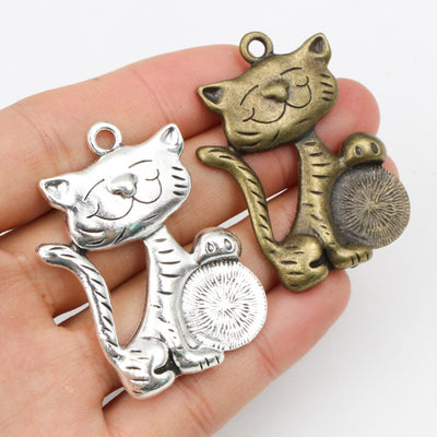 Lucky Cat Pendants with Coin Detail in Two Antique Tone Finishes — grouped product view