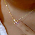 Interlocking Double Heart Pendant Necklace In Gold And Silver Tones view 1