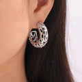 Gold Steel Hollow Openwork C-Shape Titanium Steel Earrings view 3