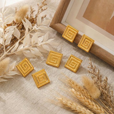 Display view of square Greek key stud earrings in main image 1.