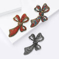 Red Crystal Long Tail Bow Brooch with Gold Tone Frame view 4