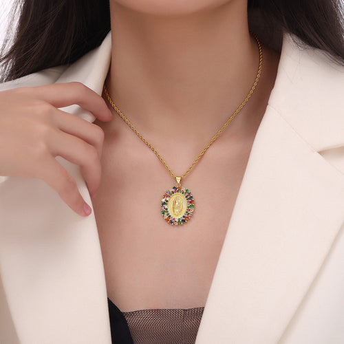 Gold multicolor halo Madonna pendant necklace worn at collarbone