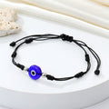 Black Cord Round Blue Evil Eye Adjustable Bracelet with Silver Beads view 1