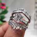 Wide Curved Baguette And Round Stone Ring Set In Silver Tone view 3