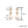 Gold Tone Triple Circle Earrings With White Pearl Drops view 4