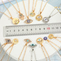 Assorted Evil Eye and Hamsa Pendant Necklaces in Fourteen Designs view 2