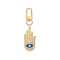 Twelve Piece Gold Tone Crystal Hamsa Heart and Evil Eye Keychain Set view 2